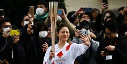 نمایش نمادین حمل مشعل المپیک در توکیو+عکس
