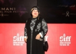 پوران درخشنده با لباس کردی در جشنواره سلیمانیه  عکس