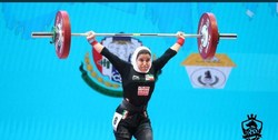 بانوی وزنه بردار ایران در خط مقدم مبارزه با کرونا