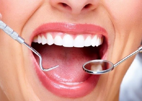 بهترین دندانپزشک برای بلیچینگ، روکش و درمان دندان درد