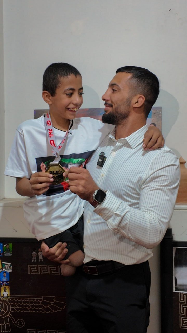 عکس| اقدام اخلاقی قهرمان ایرانی کشتی جهان و المپیک