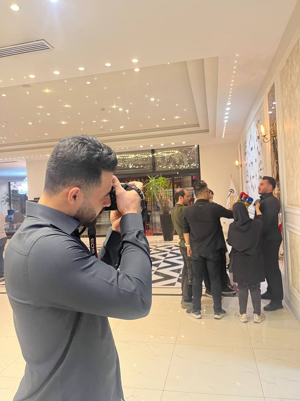 عکس| قهرمان جهان عکاس شد!